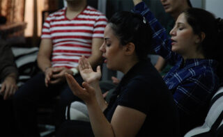 Woman Worshipping In Iran