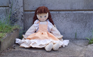 Abandoned,rag,doll,,left,in,the,dirt