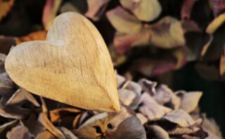 Heart-shaped object among rubble: finding gratitude in hardship